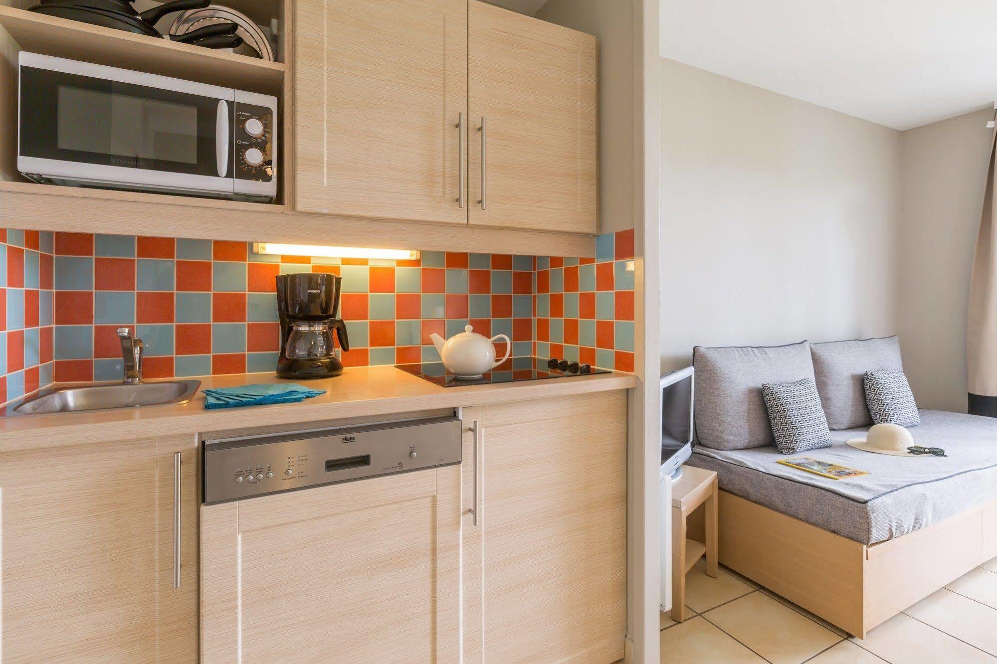 Pierre & Le Aparthotel Port-en-Bessin-Huppain
